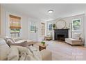 Cozy living room features a fireplace, lots of natural light, and a well-designed layout at 2704 Kool Park Ne Rd, Hickory, NC 28601