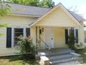 Inviting facade of a well-maintained home, showcasing its entrance with charming details at 326 S Caldwell St, Salisbury, NC 28144