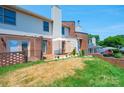 Backyard features a brick patio with white patio umbrella at 709 21St Ne Ave, Hickory, NC 28601