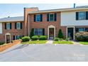 Charming brick townhouse with manicured landscaping and ample parking at 709 21St Ne Ave, Hickory, NC 28601