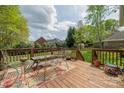 Cozy deck area with outdoor furniture set perfect for outdoor entertaining at 233 Highland Forest Dr, Clover, SC 29710