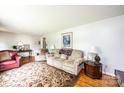 Spacious living room with hardwood floors and a comfortable seating area with natural light at 1008 2Nd Se St, Conover, NC 28613