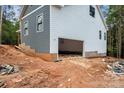 View of home showing side garage and exterior siding at 4615 Yellow Poplar Ln, Concord, NC 28025
