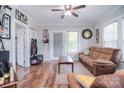 Inviting living room with hardwood floors, neutral walls, and comfortable seating at 502 Allison Nw St, Concord, NC 28025