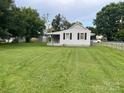 A sprawling lawn surrounds this home, offering ample space for outdoor enjoyment at 104 Franklin St, Clover, SC 29710