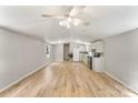 Bright and airy living room with hardwood floors that flows into a well-lit kitchen at 1354 Springwood Ln, Rock Hill, SC 29730
