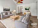 Inviting living room boasts neutral tones, plush seating, and stylish décor, perfect for comfortable living and entertaining at 1634 Dawson Ct, Rock Hill, SC 29730