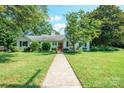 Attractive one-story home with lush landscaping and a well-maintained front yard at 630 4Th Nw Ave, Hickory, NC 28601