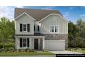 Charming two-story home features a stone facade, vertical siding, and an attached two-car garage at 143 Goorawing Ln, Mooresville, NC 28115