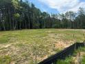 Cleared homesite surrounded by trees is the perfect spot to build your dream home at 1524 Conestoga Xing, Catawba, NC 28609