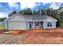 Charming blue single-story home with attached garage and craftsman-style details at 6133 Long Branch Rd, Salisbury, NC 28147