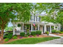 Two-story home with front porch and landscaped yard at 3203 Kelsey Plz, Kannapolis, NC 28081