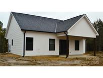 White house with black roof and covered porch at 1239 Beltline Rd # 10, Chester, SC 29706