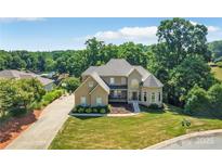 Stunning two-story home with lake views and a large backyard at 122 Long Cove Ln, Mooresville, NC 28117