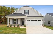 Two-story house with gray siding, white trim, and a two-car garage at 8336 Acadia Pkwy, Sherrills Ford, NC 28673