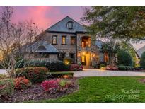 Stunning home with stone and brick facade, beautifully landscaped at 300 Eagle Bend Dr, Waxhaw, NC 28173