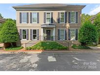 Two-story house with shutters, steps, and landscaping at 1218 Wareham Ct, Charlotte, NC 28207