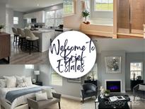 Modern kitchen with island and stainless steel appliances at 1034 Heath Helms Rd, Monroe, NC 28110