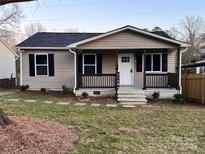 Charming single-story home with neutral siding, black shutters, and a welcoming front porch at 337 Friendship Dr, Rock Hill, SC 29730