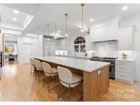 Spacious kitchen boasts a large island, high-end appliances, and ample cabinet storage at 1446 Queens W Rd, Charlotte, NC 28207