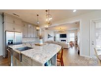 Spacious kitchen with granite countertops and stainless steel appliances at 2402 Paddlers Cove Dr, Clover, SC 29710