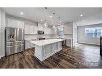 Modern kitchen with stainless steel appliances and an island at 432 Burr St # 73, Indian Trail, NC 28079