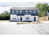 A modern two-story townhome featuring a gray and white facade at 816 Fairview St # B, Kannapolis, NC 28083