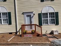 Condo exterior with a welcoming entrance and nicely kept landscaping at 1067 19Th Ne St # B, Hickory, NC 28601
