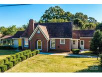 Charming brick home with manicured landscaping at 815 6Th Sw Ave, Hickory, NC 28602