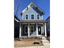 Two-story craftsman style home with gray siding and a front porch at 714 Barrel Aly, Fort Mill, SC 29715