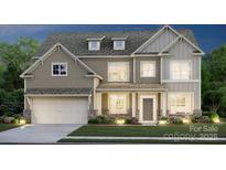 Two-story home with light brown siding, white accents, and landscaping at 117 Jentri Way, Mooresville, NC 28115