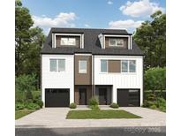 Modern two-story duplex features a contemporary design, curb appeal, and integrated two-car garages at 1916 Irma St, Charlotte, NC 28216