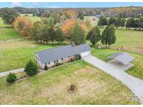 Ranch home with detached carport on large lot at 1926 Hopewell Church Rd, Sherrills Ford, NC 28673