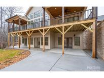 Stunning walkout basement with ample patio space and balcony above at 6630 Vesuvius Furnace Rd # 1, Denver, NC 28037