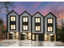 Modern three-story townhouses with attached garages at 160 Mattoon St, Charlotte, NC 28216