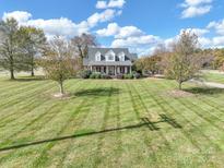 Brick house with a front porch, and large yard at 4815 Sugar And Wine Rd, Monroe, NC 28110