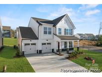 Two-story house with white siding, gray roof, and a two-car garage at 1021 Freeman View Dr # 154P, Albemarle, NC 28001