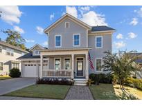 Charming two-story house with gray siding, front porch, and landscaped yard at 440 Luray Way, Rock Hill, SC 29730