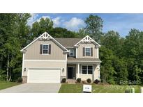 Charming two-story home featuring a two-car garage and craftsman-style architectural details at 2387 Trundle Dr # Cwo0155, Gastonia, NC 28054