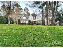 Two-story house with stone accents and a large front yard at 9267 Egret Rdg # 41, Belmont, NC 28012