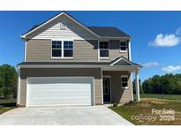 Charming two-story home featuring a classic design and a spacious two-car garage at 104 Salem Springs Ln, Statesville, NC 28625