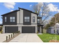 Modern three-unit building with stone and dark accents at 2205 Catalina Ave, Charlotte, NC 28206