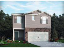 Two-story house with gray siding, brick accents, and a two-car garage at 1204 31St St, Conover, NC 28613