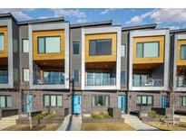 Modern townhouses with sleek design, wood accents, and private entrances at 819 E 36Th St, Charlotte, NC 28205