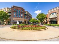 Attractive condo community with brick facade, balconies and landscaping in a vibrant community at 721 Governor Morrison St # 425, Charlotte, NC 28211