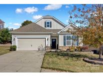 Charming one-story home with a two-car garage and landscaped front yard at 3657 Norman View Dr, Sherrills Ford, NC 28673