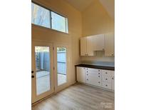 Bright kitchen with granite counters and stainless steel appliances at 6130 Heathstone Ln, Charlotte, NC 28210