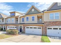 Charming townhomes feature attached garages and manicured landscaping at 4146 La Crema Dr, Charlotte, NC 28214