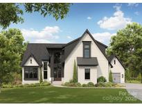 Stunning two-story modern farmhouse with black trim, white siding, and lush landscaping at Lot 7 Hamlin Rd # 7, Fort Mill, SC 29715