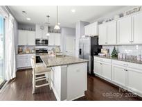 Modern kitchen with stainless steel appliances and granite countertops at 1969 Tablerock Dr, York, SC 29745